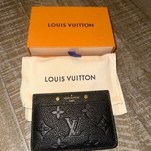 Black Louis Vuitton card holder wallet. Box and cloth included.